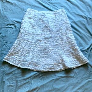 White Silkland A-line skirt with white ruffles